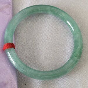Jade braclet made of Jadeite - beautiful solid light green